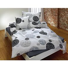 Linge de lit avec motif de cercles gris et noirs sur fond blanc